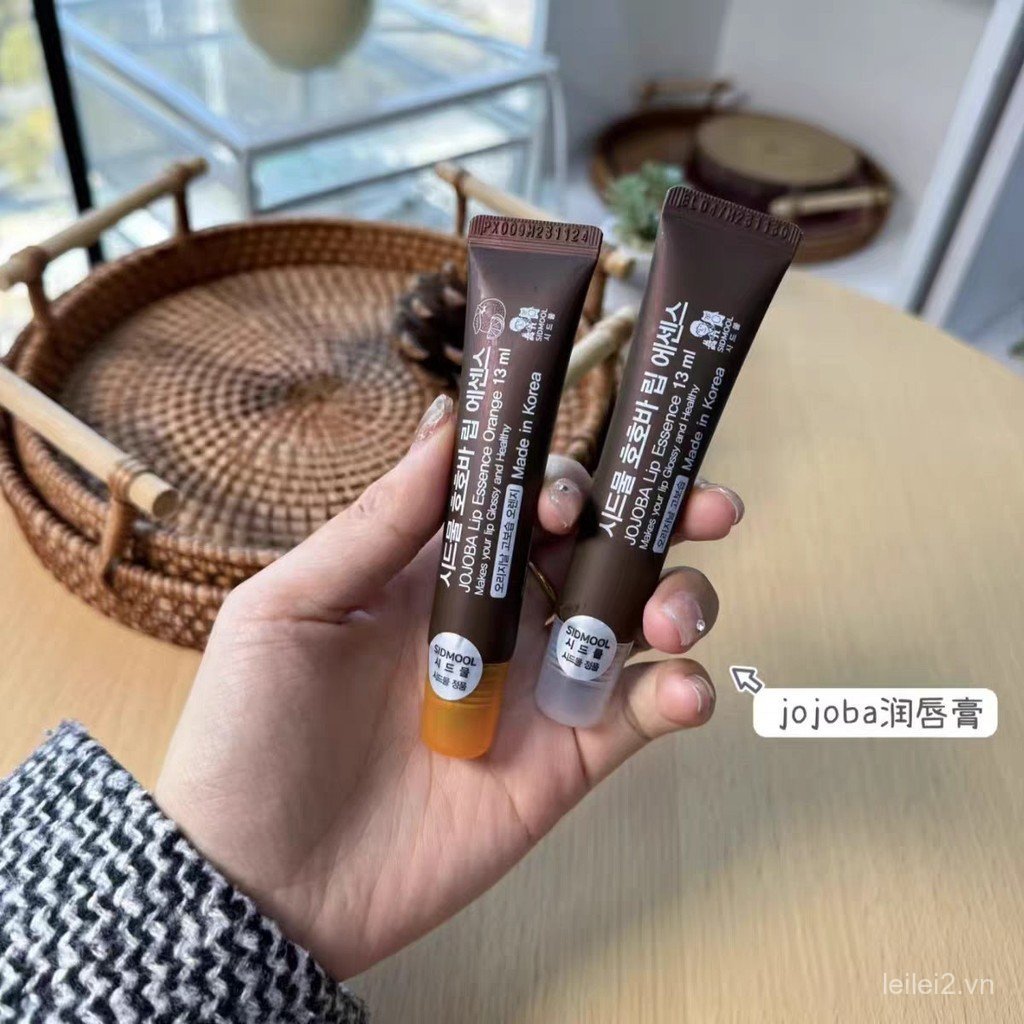 Son dưỡng môi dưỡng ẩm cao jojoba Hàn Quốc Dầu jojoba Dưỡng ẩm dưỡng ẩm Dầu môi Mặt nạ môi Son bóng 