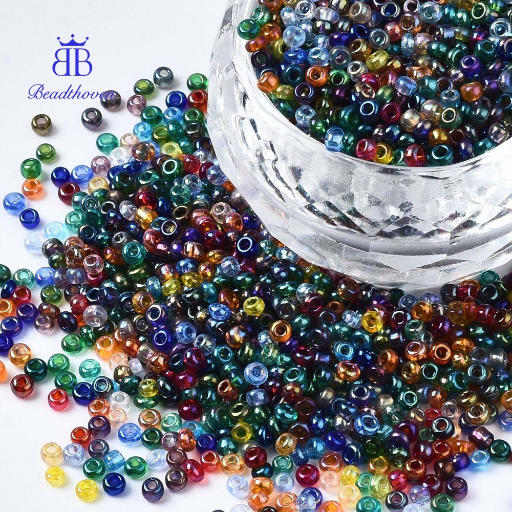 Hạt Thủy Tinh Cầu Vồng Tròn 2-2.5x1.5-2mm, Lỗ 0.8mm - 1 Pound