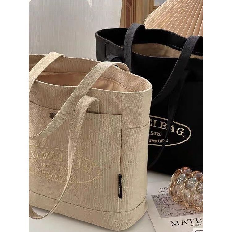 túi tote có khóa kéo túi tote Túi Tote Nam Phong Cách Mới Túi Đeo Vai Nữ Dung Tích Lớn Túi Tote Sinh Viên Vải Canvas Túi Học Sinh Cao Đẳng Sinh Viên Lớp