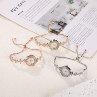 Đồng hồ nữ thời trang Pháp Sáng tạo Kim cương tròn uốn lượn họa tiết hoa Điều chỉnh miễn phí Đồng hồ đeo tay Đồng hồ nữ 3.10 B