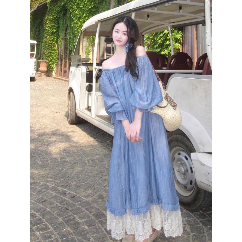 Đầm một vai dài tay lo phong cách thoải mái màu xanh, phù hợp cho mùa hè