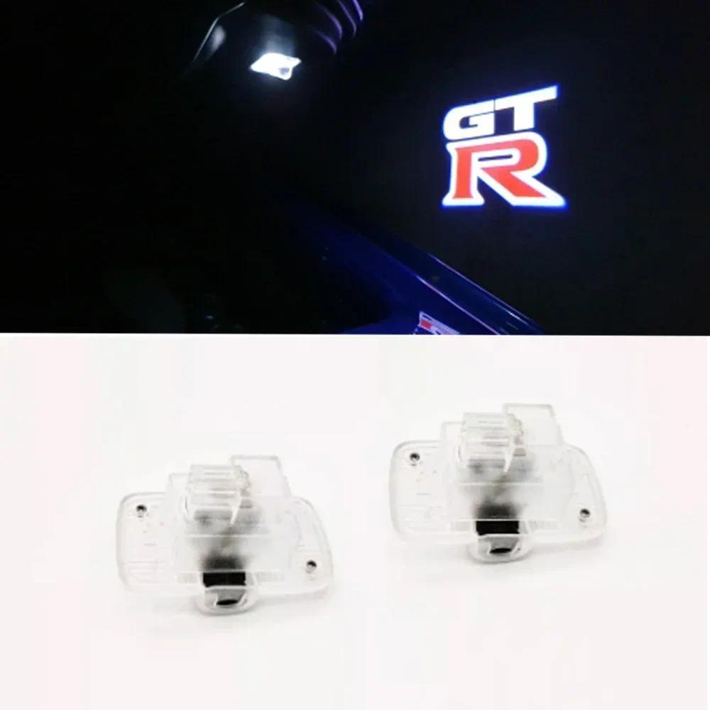 R35 R34 GTR Đèn Cửa 2 Chiếc GT-R LED Thảm Bóng Đèn Ma Lịch Sự Đèn Cho Xe Nissan GTR R35 R34 Teana Ni