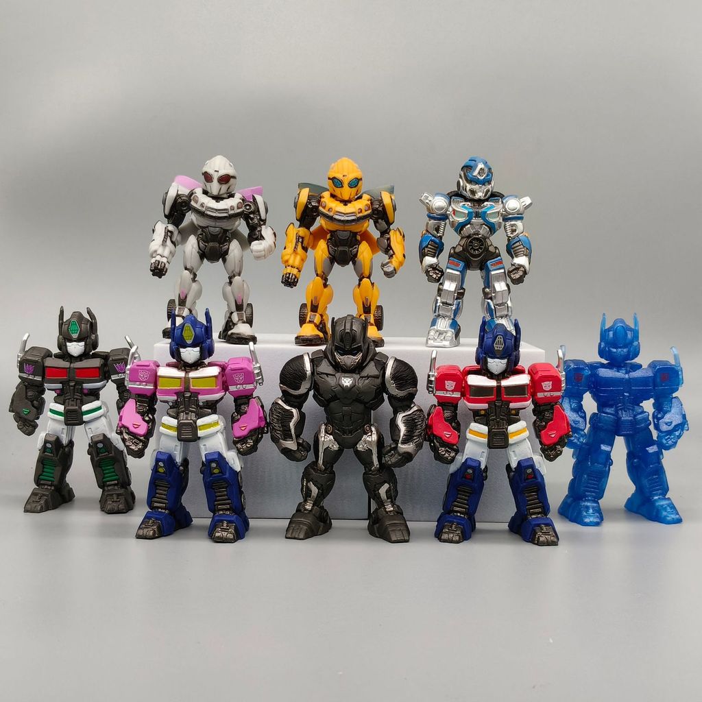 Tám Loại Đồ Trang Trí Sáng Tạo Autobot Bộ 8 Món Hình Búp Bê Bốn Màu Autobot Búp Bê Trang Trí Xe Hơi