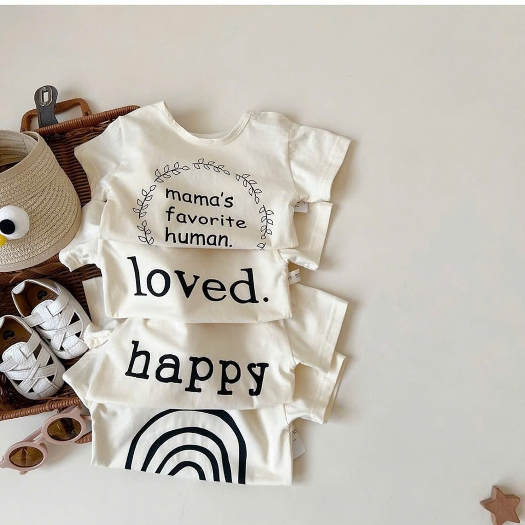 Set 2 áo màu kem (hình random) cho bé