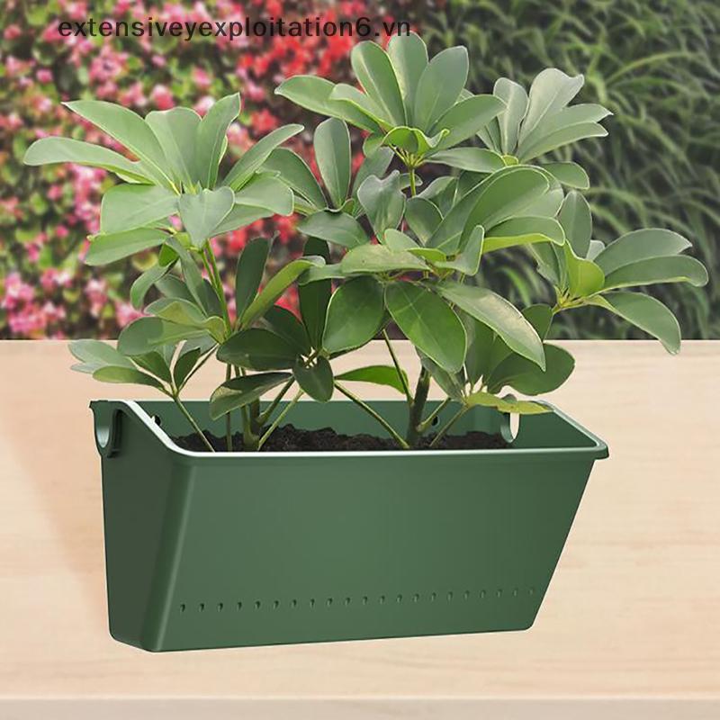 # expen # Hộp đựng chậu hoa treo tường màu xanh lá cây dọc.