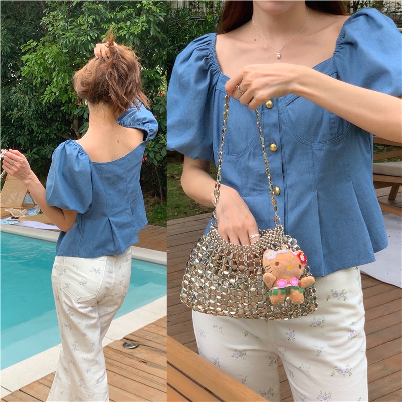 Áo Sơ Mi Denim Ngắn Tay Phồng Phối Nút Kim Loại 2 Màu Thời Trang Pháp Quý Phái 64898