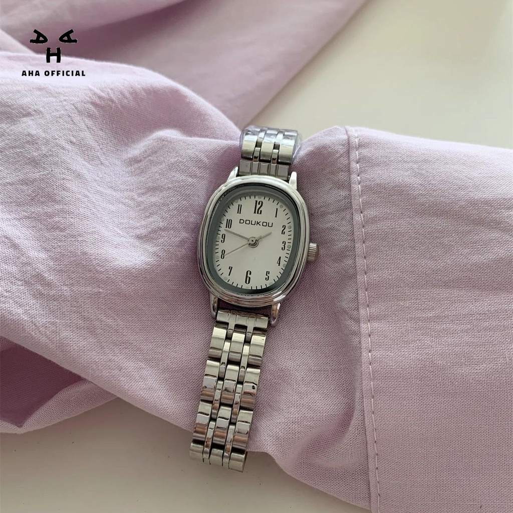 Đồng hồ mặt số nhỏ hình bầu dục dành cho nữ Hàn Quốc Ánh sáng đơn giản sang trọng Phong cách mát mẻ Dây thép cao cấp Niche Quartz Đồng hồ nữ