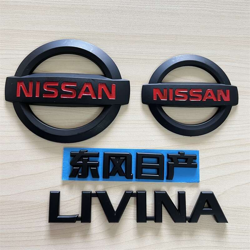 Thích hợp cho Logo xe Nissan Liwei LIVINA Logo tiếng Anh Logo phía trước Dongfeng Nhật Bản Nissan Bl