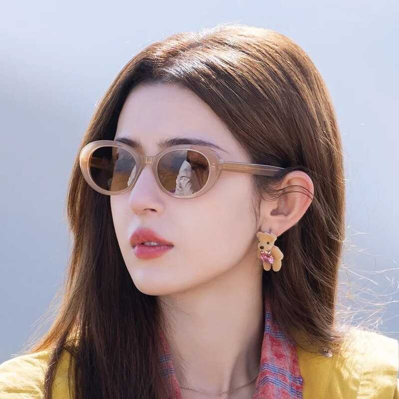 Kính râm hình bầu dục hợp thời trang mới 1033 Kính râm ống kính Nylon Acetate màu thạch Kính râm chụ