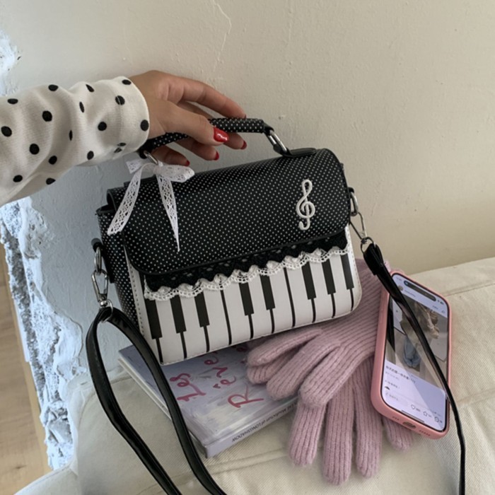 l lolita lolita túi niche ins túi màu đen 2026 mùa xuân và mùa hè mới của Nhật Bản túi cầm tay túi