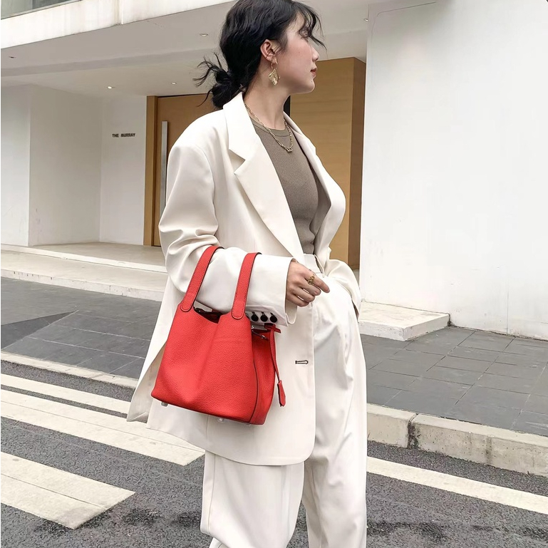 Túi Xách Da Bò Thật Dáng Tròn Nhỏ Dễ Phối Đồ Thời Trang Cho Nữ