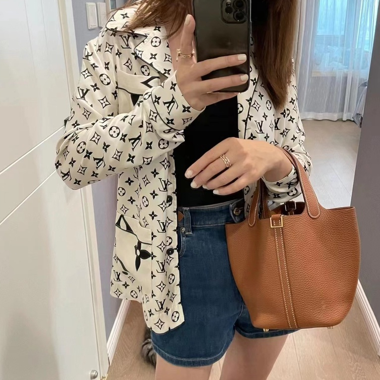 Túi Xách Da Bò Thật Dáng Tròn Nhỏ Dễ Phối Đồ Thời Trang Cho Nữ