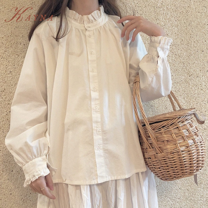 KAYNA Nhật Bản siêu cổ tích lolita ren áo sơ mi cho phụ nữ Vintage Hồng Kông hương vị thiết kế thích hợp JK cô gái cảm giác muối buộc áo mỏng