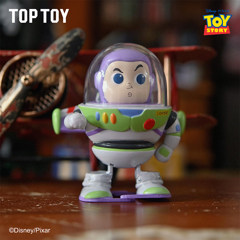 Dòng Đồ Chơi Lật Đật Cót Toy Story Series Nhân Vật Woody TOPTOY (9cm x 9cm x 12cm)