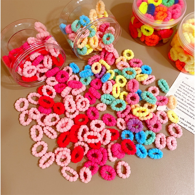 Hộp 100 Dây Buộc Tóc Nhiều Màu Sắc Dễ Thương Cho Bé