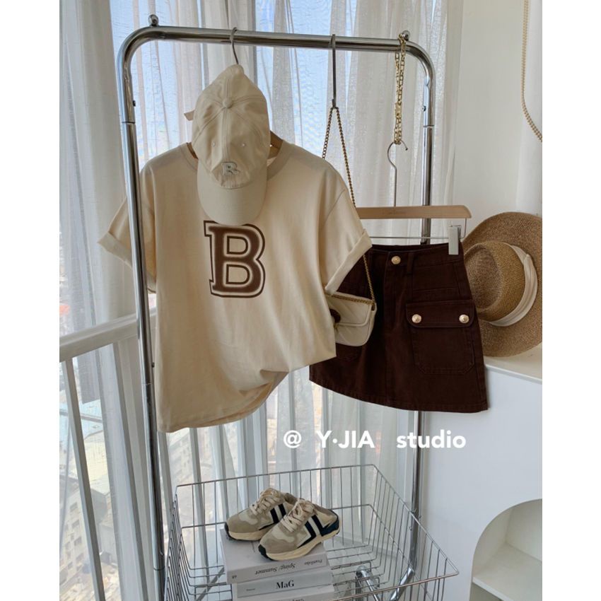 Bộ Áo Thun Tay Ngắn Dáng Rộng In Chữ + Chân Váy Ngắn Lưng Cao Thời Trang Mùa Hè 2023 Mới Chất Lượng Cao Cho Nữ