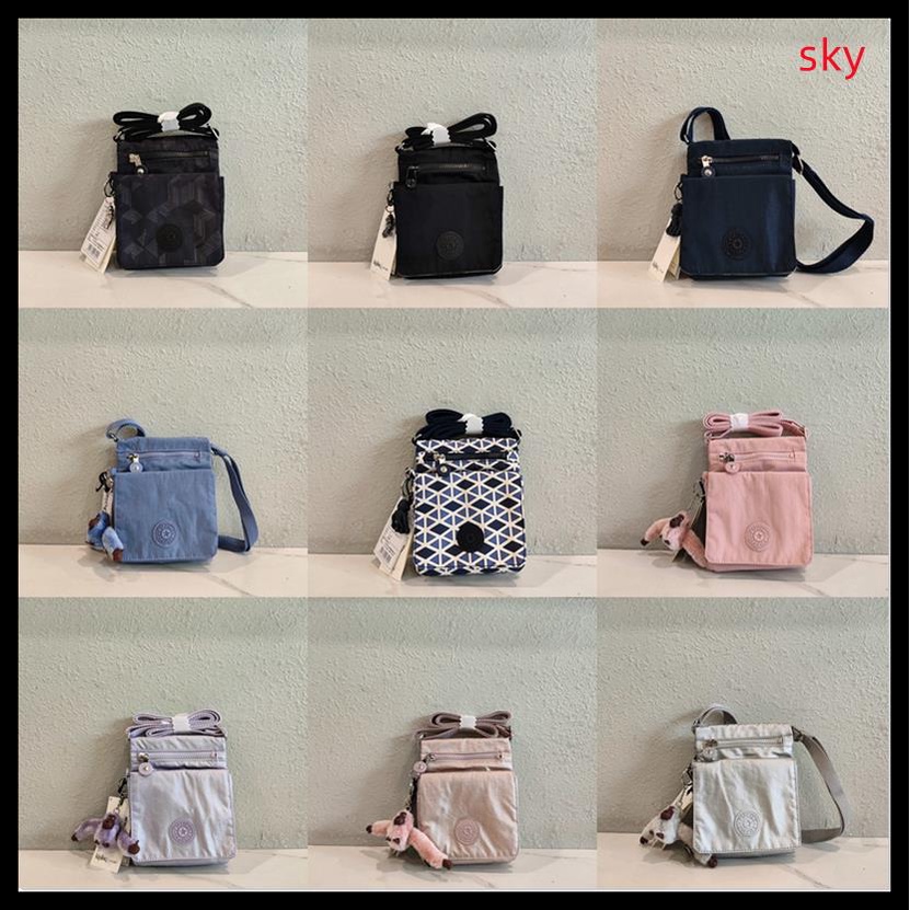 Kipling Túi Đeo Chéo Mini Đựng Hộ Chiếu Chất Liệu Nylon Chống Thấm Nước Thiết Kế Nhiều Túi Phong Cách Mới 17291