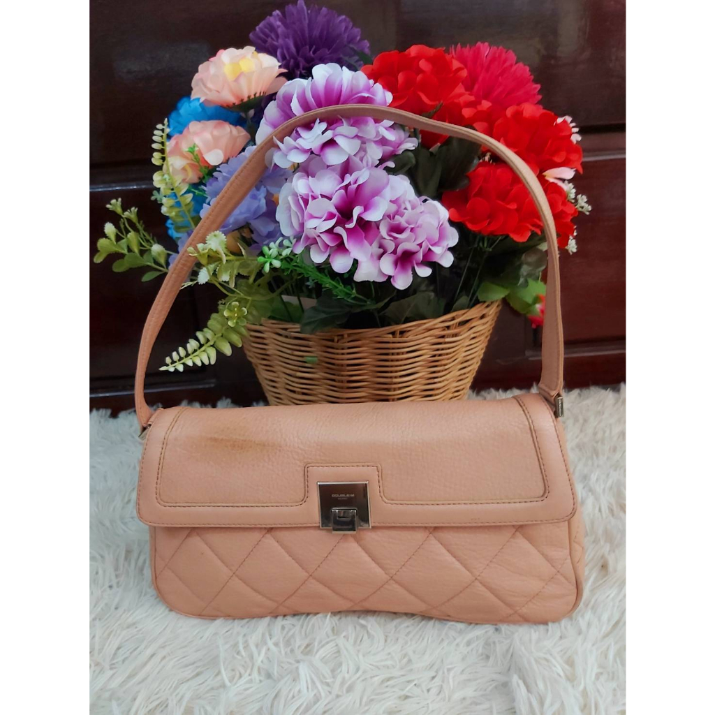 Túi da thật Double M Milano có lỗ hổng