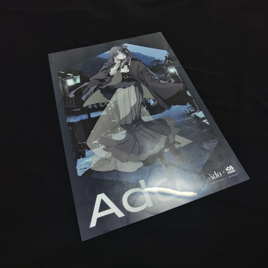 Poster cuộn Ado x Kura-Sushi được cấp phép