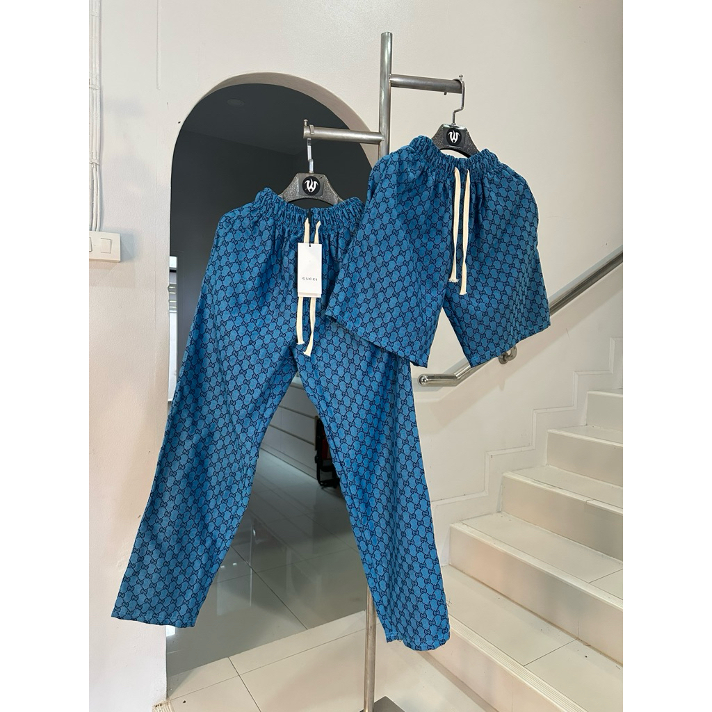 Quần short vải dệt Ggg và màu xanh dài