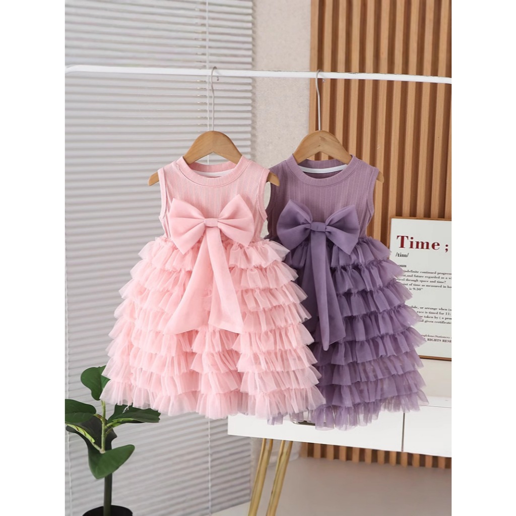 Váy trẻ em màu hồng và tím B365