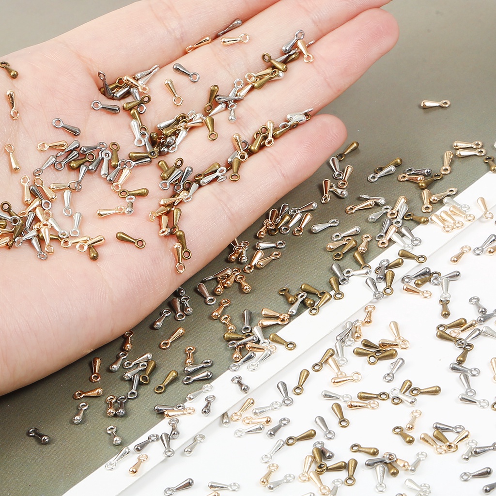 Set 100 Mặt Dây Chuyền Hình Giọt Nước 2X7mm Bằng Hợp Kim Làm Trang Sức Thủ Công diy