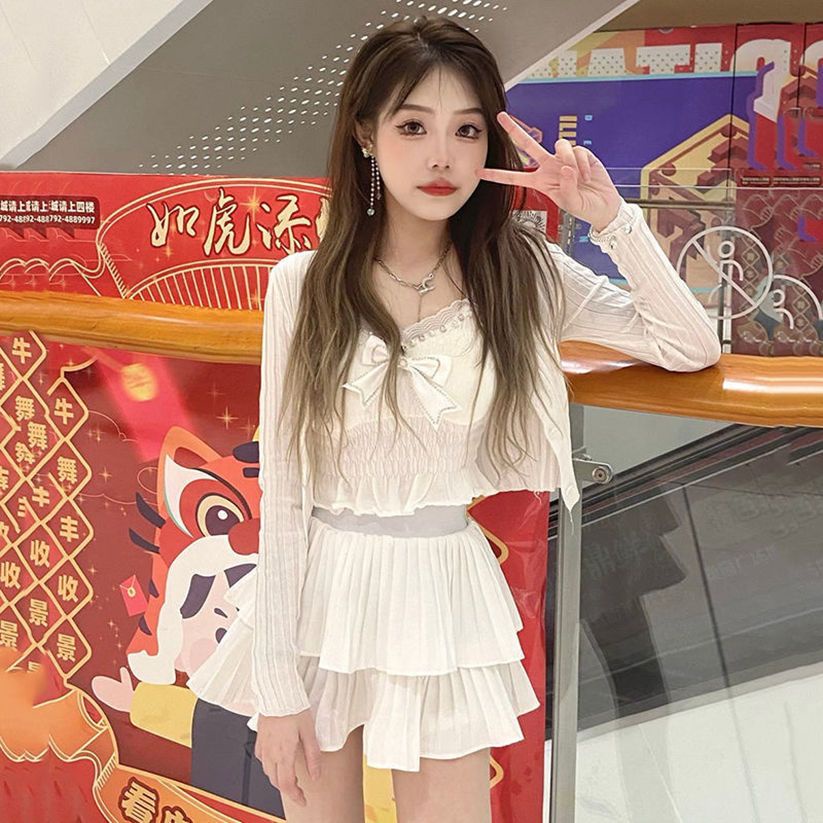 Bộ Áo Khoác Cardigan Dệt Kim + Áo Hai Dây Đính Nơ + Chân Váy Ngắn Xếp Tầng Nữ Tính