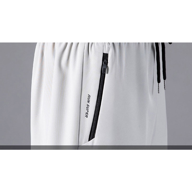 Quần Short Thể Thao Vải Lụa Lạnh Mỏng Nhanh Khô Màu Trơn Phối Dây Rút Thời Trang Mùa Hè Cho Nam