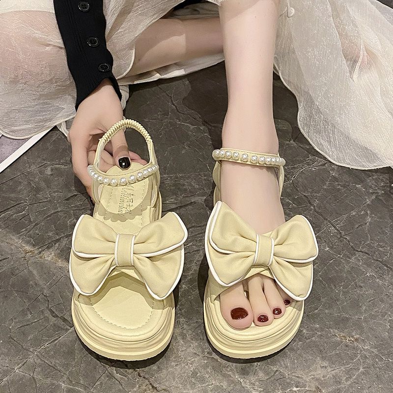 Giày Sandal Đế Dày Hở Ngón Quai Đính Nơ Ngọc Trai Thời Trang Mùa Hè 2023 Phong Cách Roman Cho Nữ