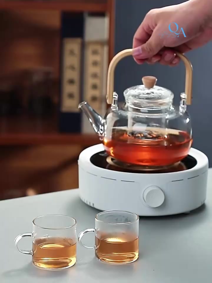 Ấm thủy tinh chịu nhiệt tay cầm gỗ