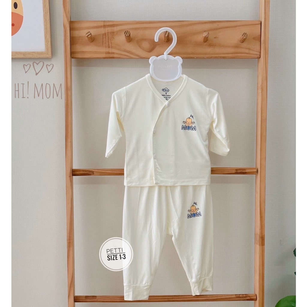 Bộ sơ sinh  dài tay Pettit nền trắng cúc cài lệch phong cách Hàn 2023