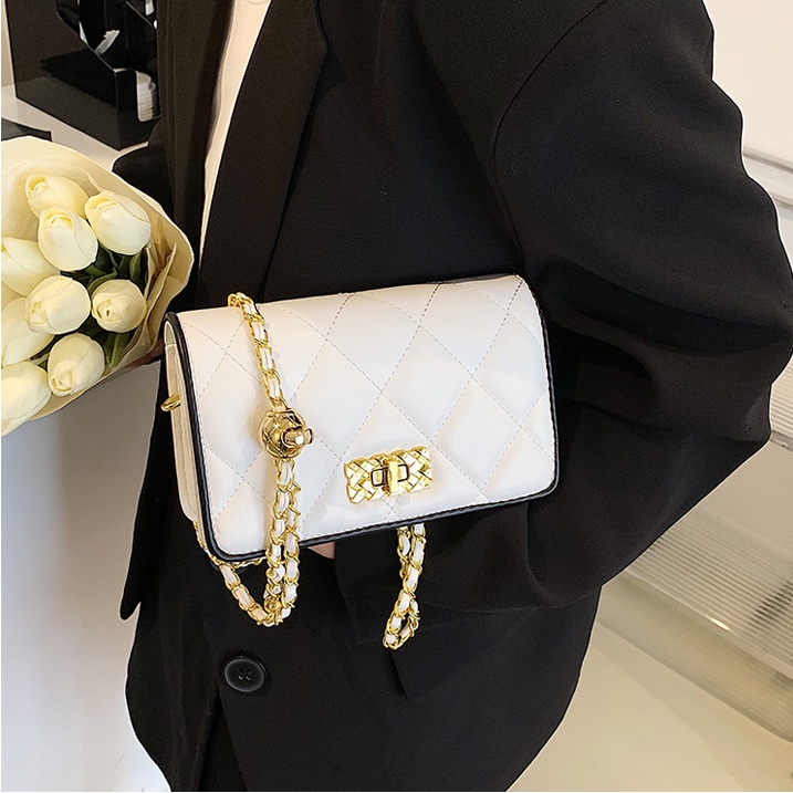 Túi xách nữ thêu chỉ trám chất da cao cấp khóa xoay xịn xò Capucha T275