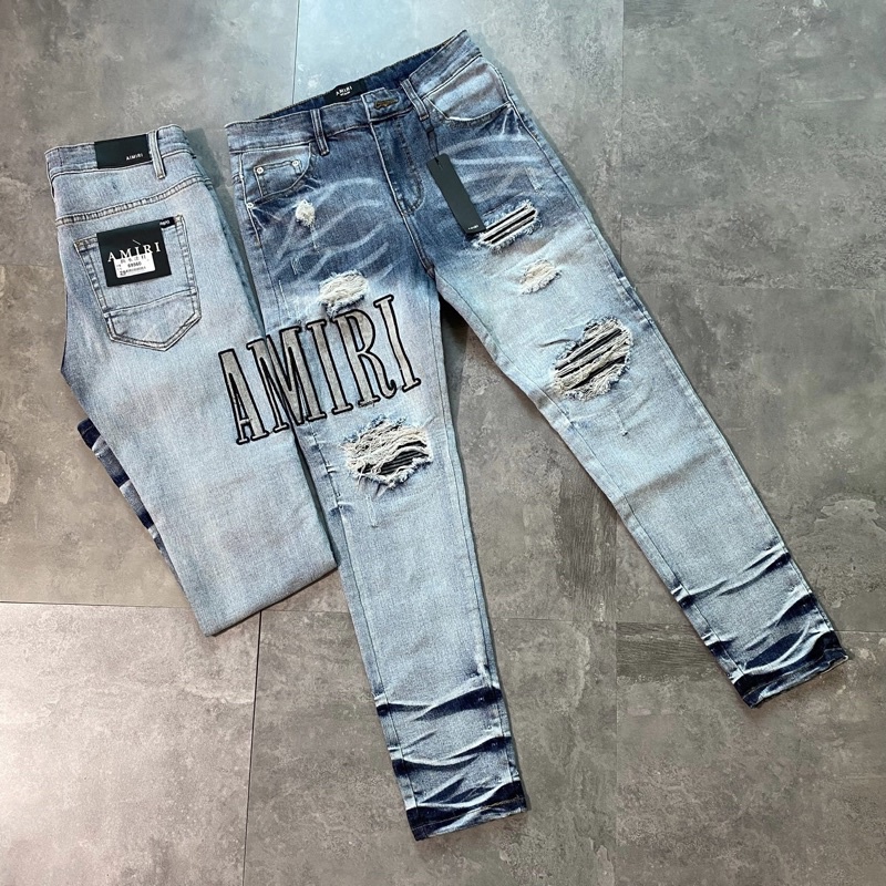 Quần jean bò nam Amiri slimfit xanh khói rách tua lót vải đen thêu chữ đùi