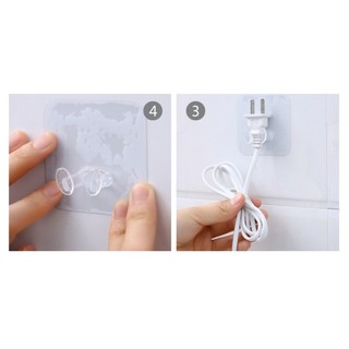 Miếng dán trong suốt móc dán tường kê điện thoại sạc, giữ phích dây cắm