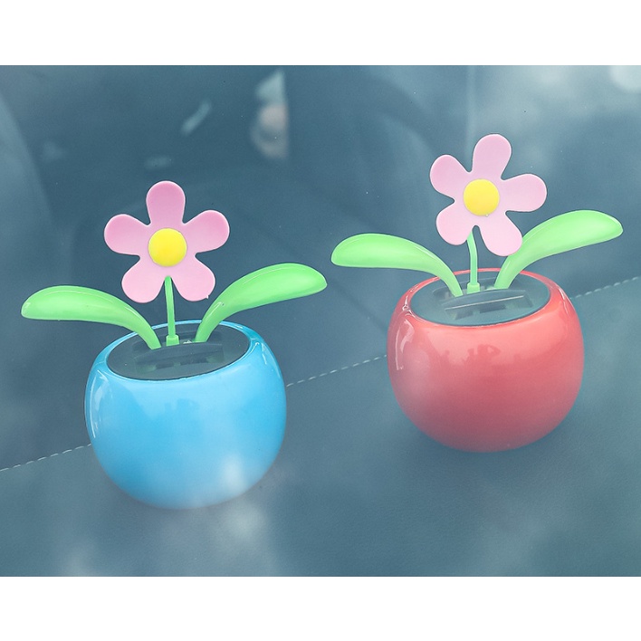 Hàng mới về- Hoa nhẩy múa-Set decor tình nhân chậu hoa nhảy múa năng lượng mặt trời trang trí taplo ô tô, xe hơi.