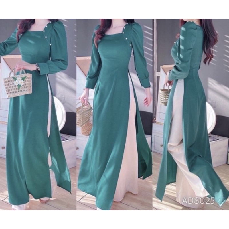 Áo dài lụa màu xanh lý đáp vai đính ngọc thiết kế tay bồng.-vững trần