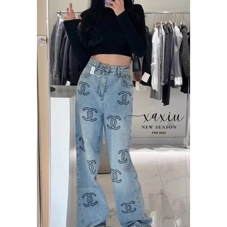 Quần jean hoạ tiết qccc