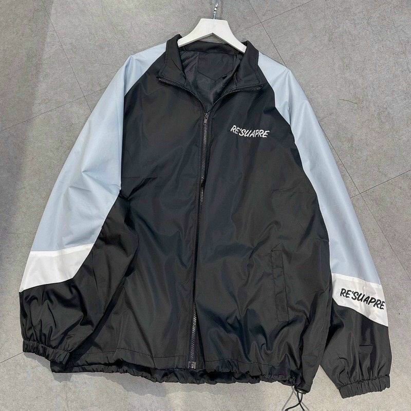 Áo khoác dù nam nữ logo RÉUAPRE được may từ chất dù hai lớp dày và mềm mịn có hai size L từkg,XL từkg