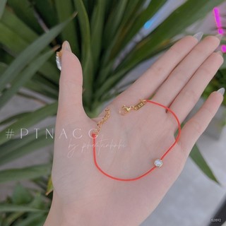 Lắc tay chỉ đỏ may mắn, vòng tay chỉ đỏ charm titan vàng đính đá tròn .PTNACC.