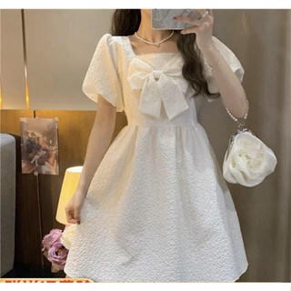 Đầm gấm trắng cổ vuông tay bồng đính nơ- váy babydoll dáng xòe chất gấm xốp tiểu thư công chúa đi chơi dự tiệc hàn quốc