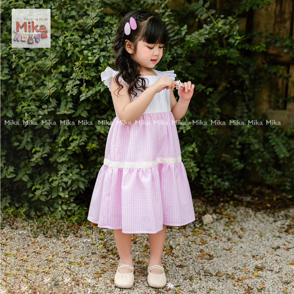 Váy bé gái MIKA tay cánh tiên phối tùng xòe sọc caro màu xanh , màu hồng . Đầm cho bé gái từ 10kg đến 32kg