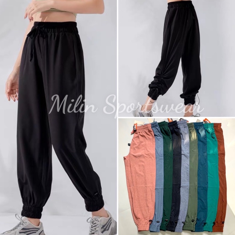 Quần Jogger Thể Thao Nữ Rút Dây Vải Dù Tập Gym, Chạy Bộ, Phượt - QJ012