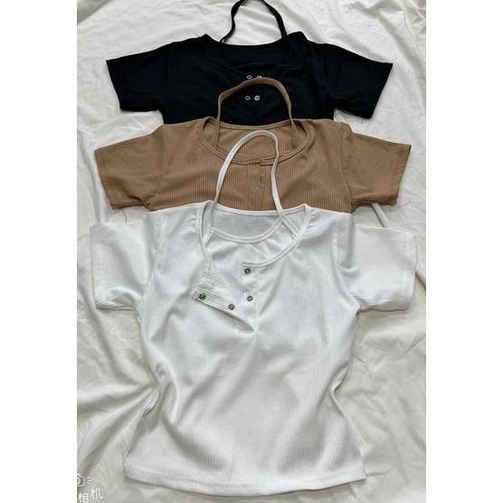 Áo gân phối yếm nút bấm