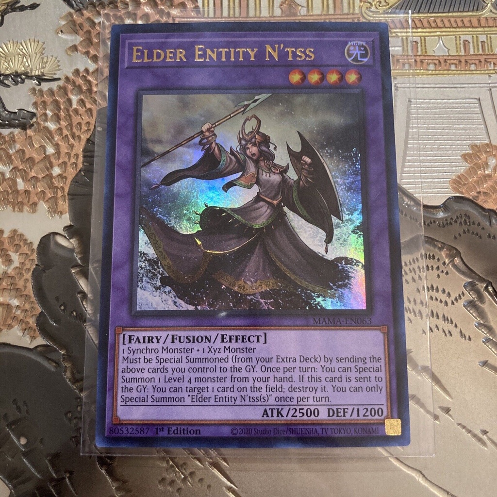 Thẻ bài YUGIOH - Elder Entity N'tss - MAMA-EN063 - Ultra Rare 1st Edition - Fusion Monster
