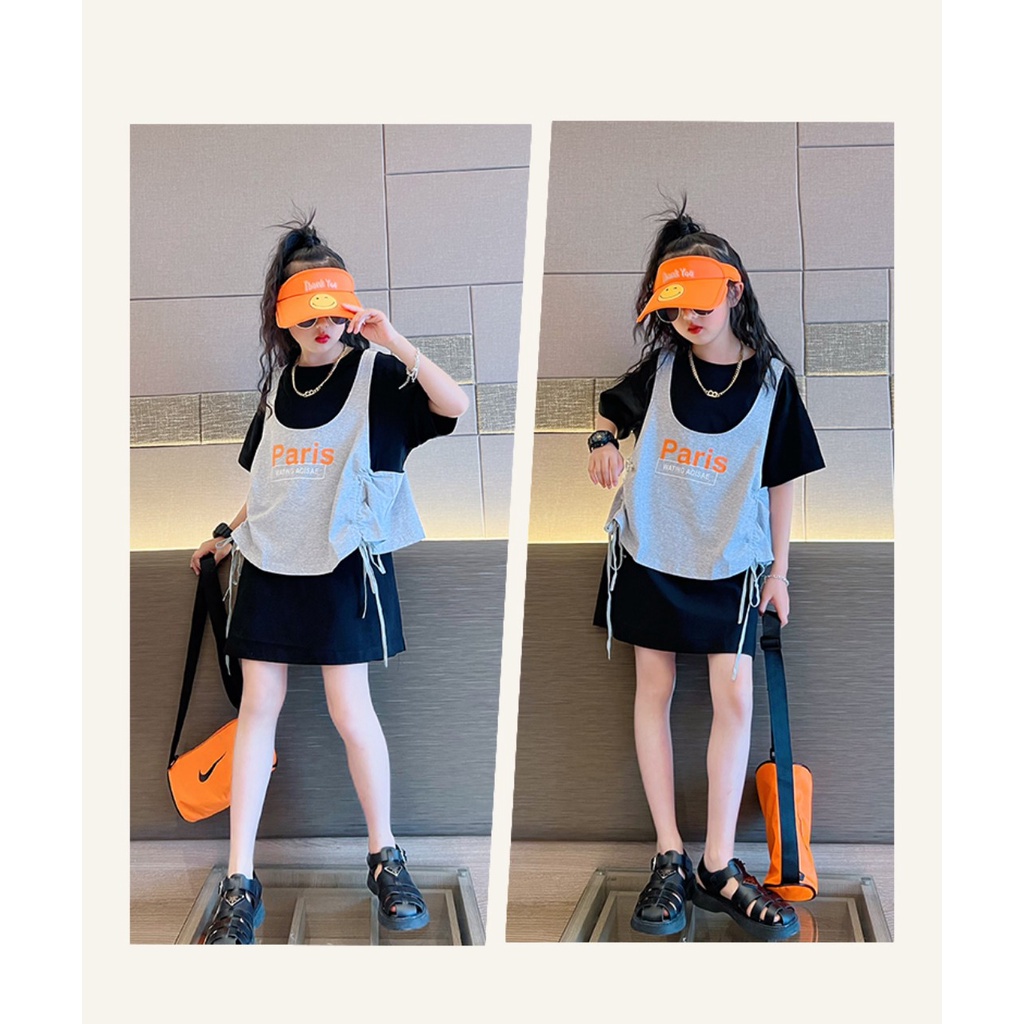 Set váy xuông dành cho bé gái 18-45kg in chữ PARIS. Chất liệu thoáng mát, co dãn tốt. HA4