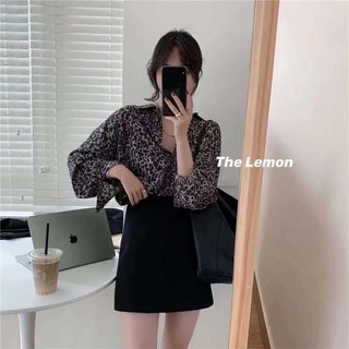 Áo sơ mi hoạ tiết báo cổ đức