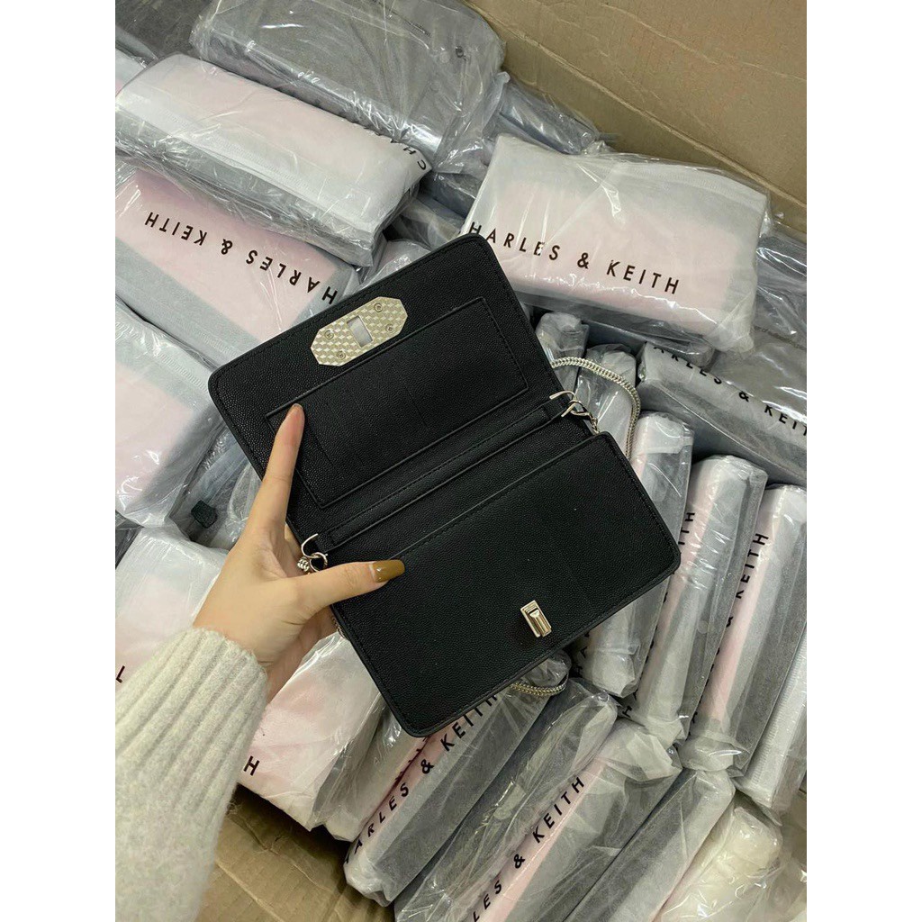 Túi đeo chéo - Túi C.K da gạo dáng dẹt size 18cm 2màu đen-trắng