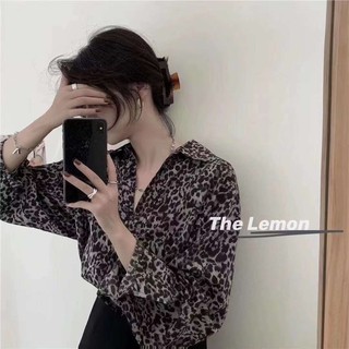 Áo sơ mi hoạ tiết báo cổ đức
