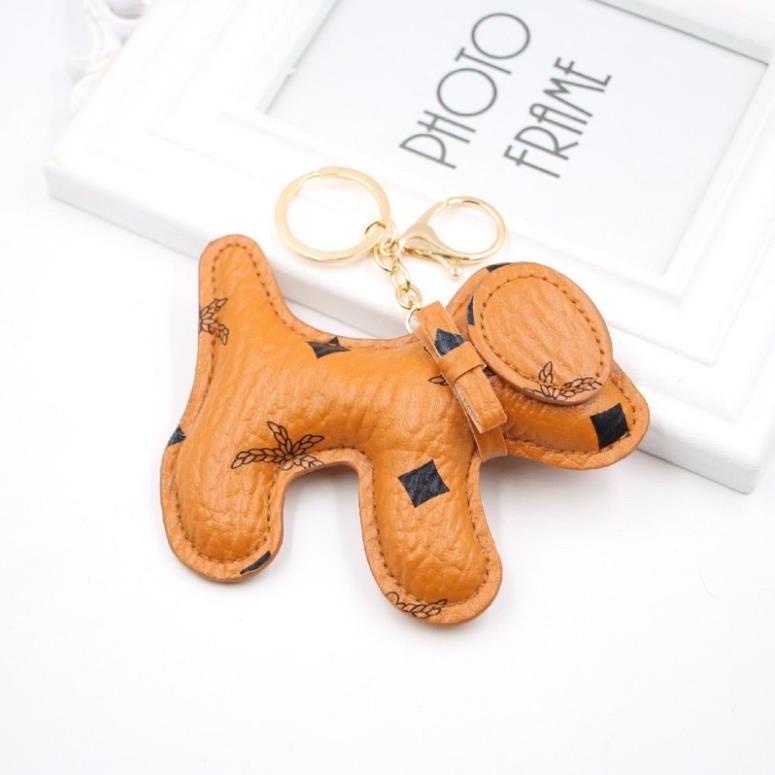 Móc Khoá Da PU chống nước hình sieu dễ thươngg 3 màu ĐEN/NÂU/BE