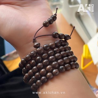 Chuỗi tràng 108 hạt gỗ mun tinh dầu trầm + lá bồ đề